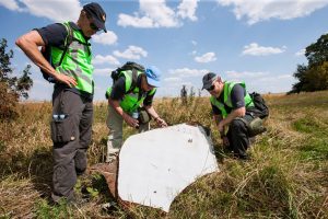 A part of the wreckage of MH17 is viewed by accident investigators (Photo: Dutch Ministry of Defense).