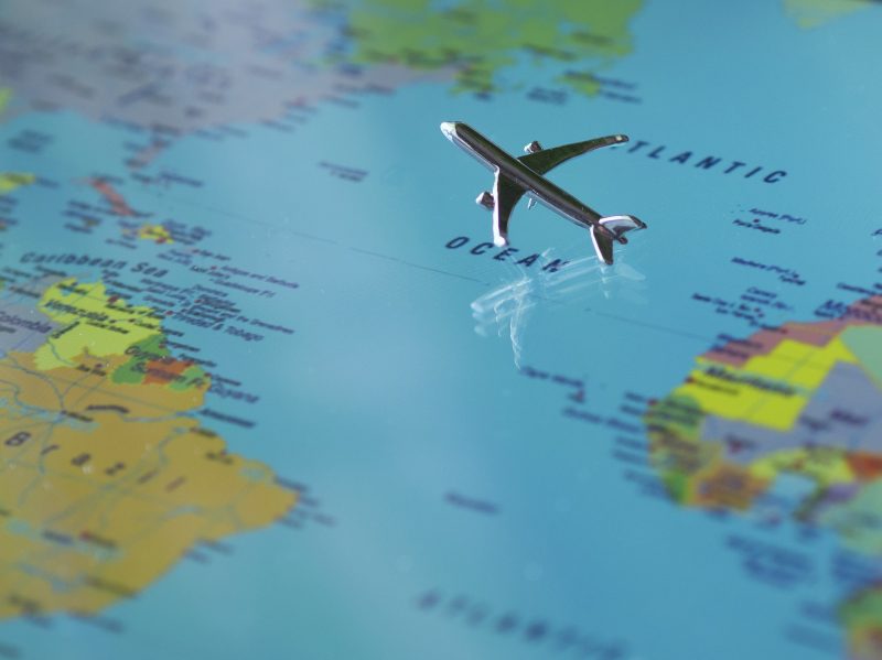 Toy plane over a map (Photo: Pixabay).