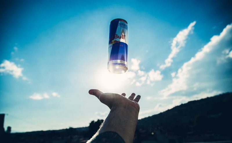 Red Bull beverage can (Photo: Unsplash / Luis Domínguez).